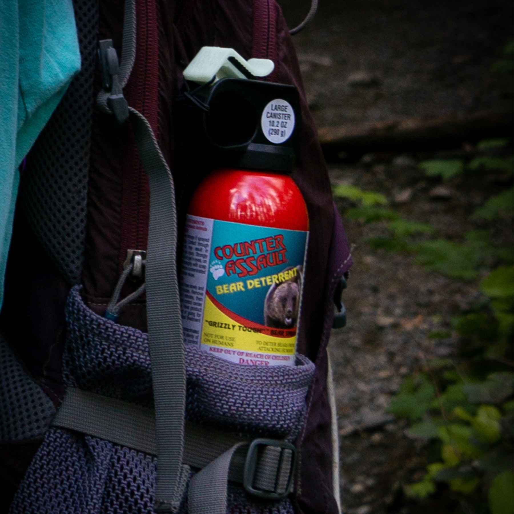 Bag with a Counter Assault bear deterrent spray 