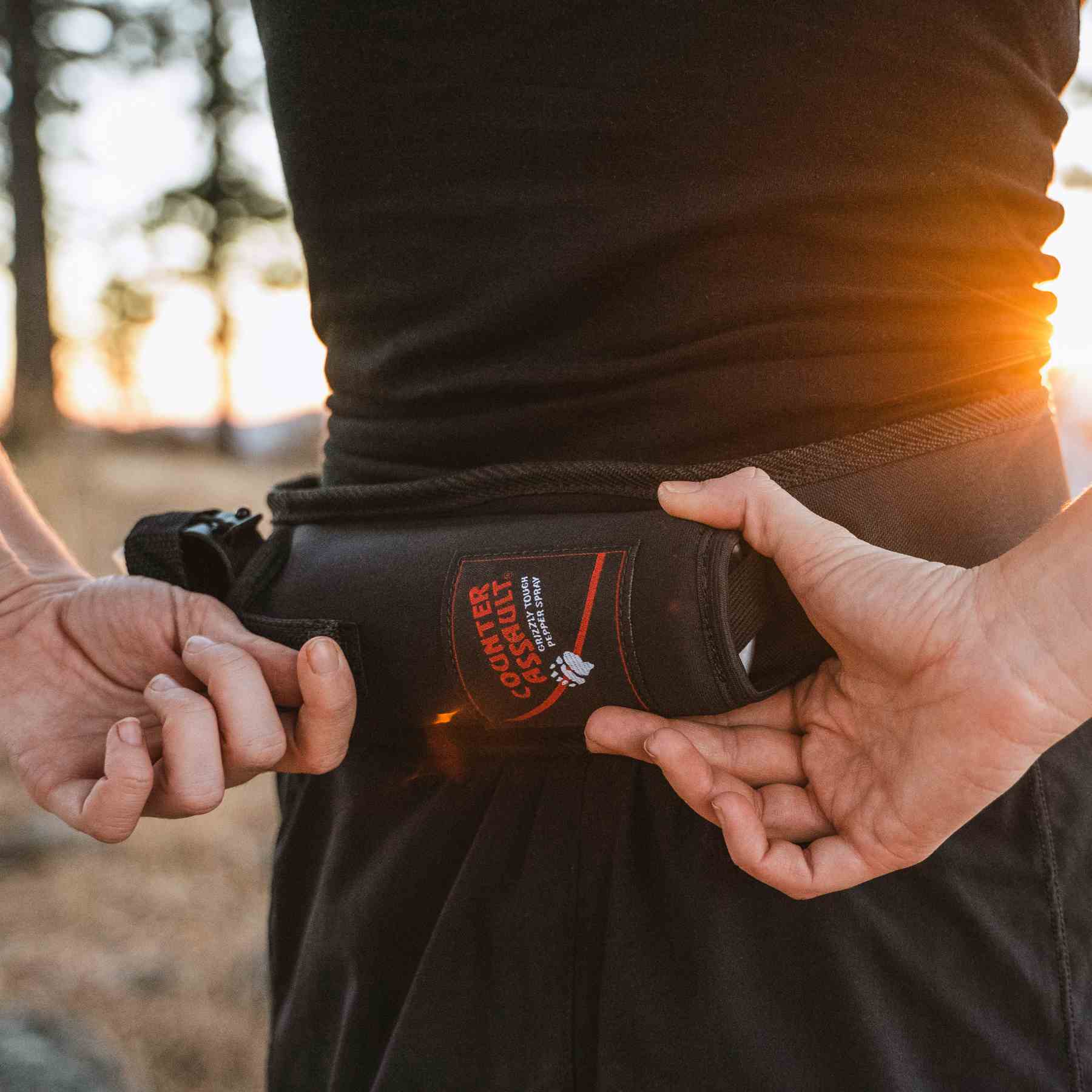 Woman adjusting the trail runner holster