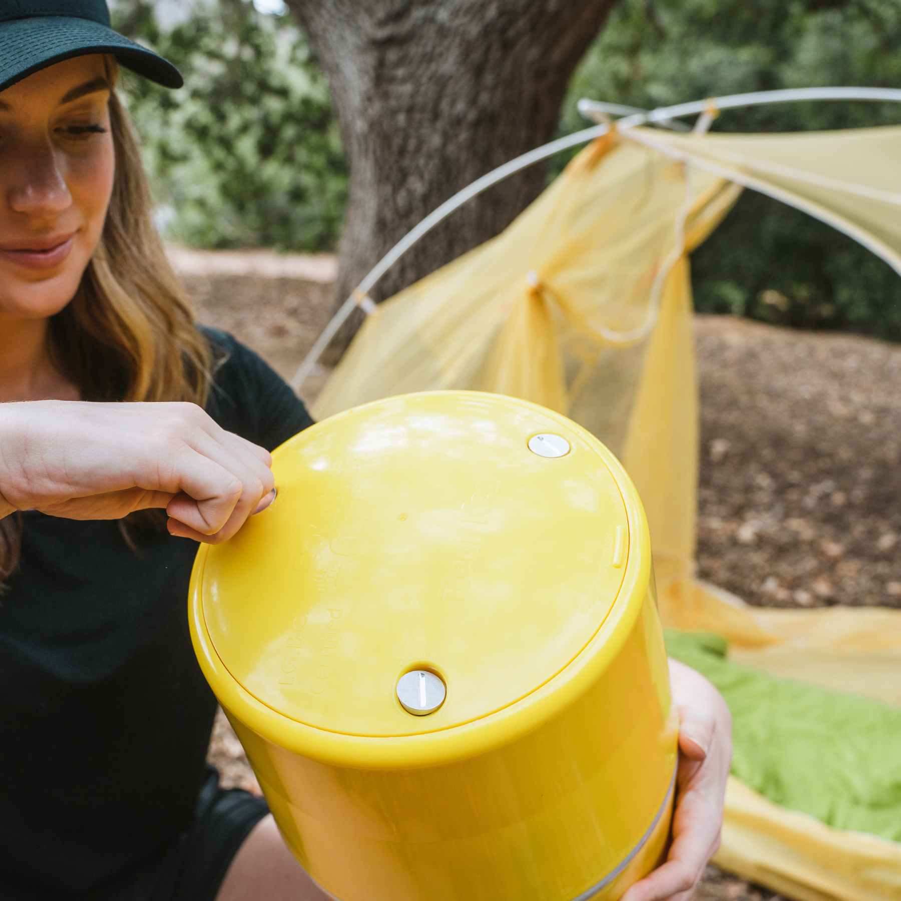 Woman unlocking the bear keg with a coin