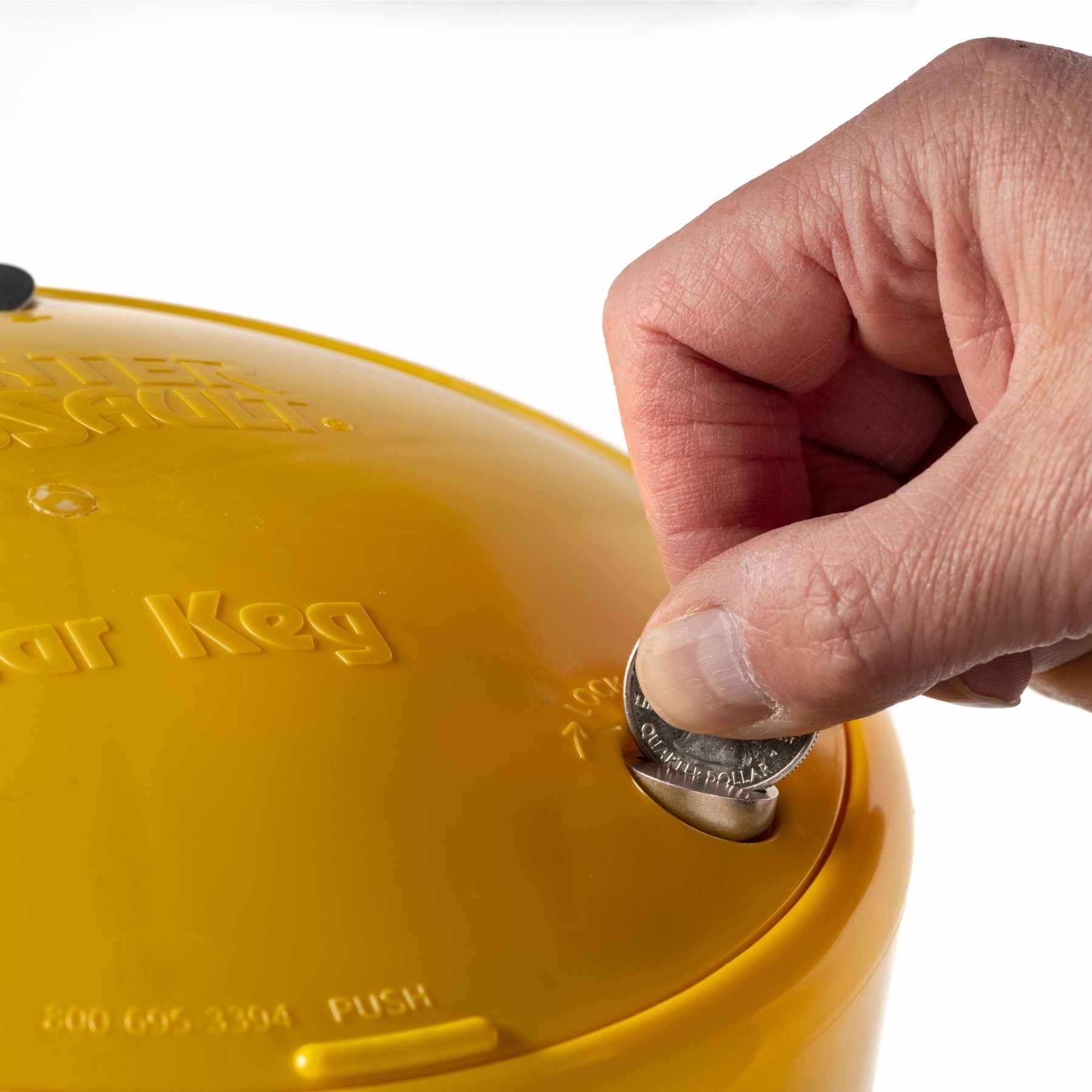 Man unlocking the keg with a coin