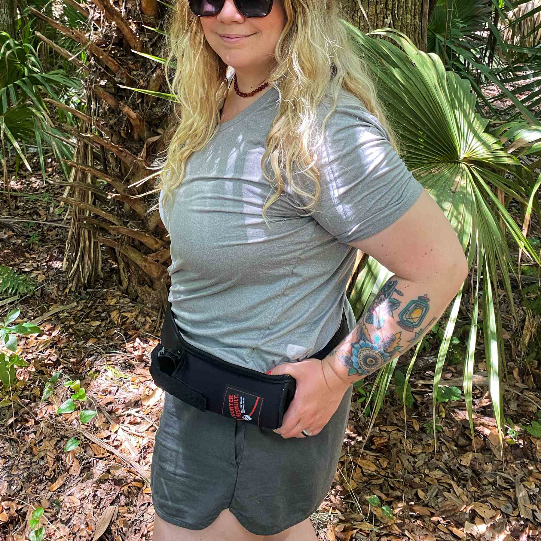 Woman with a trail runner holster attached