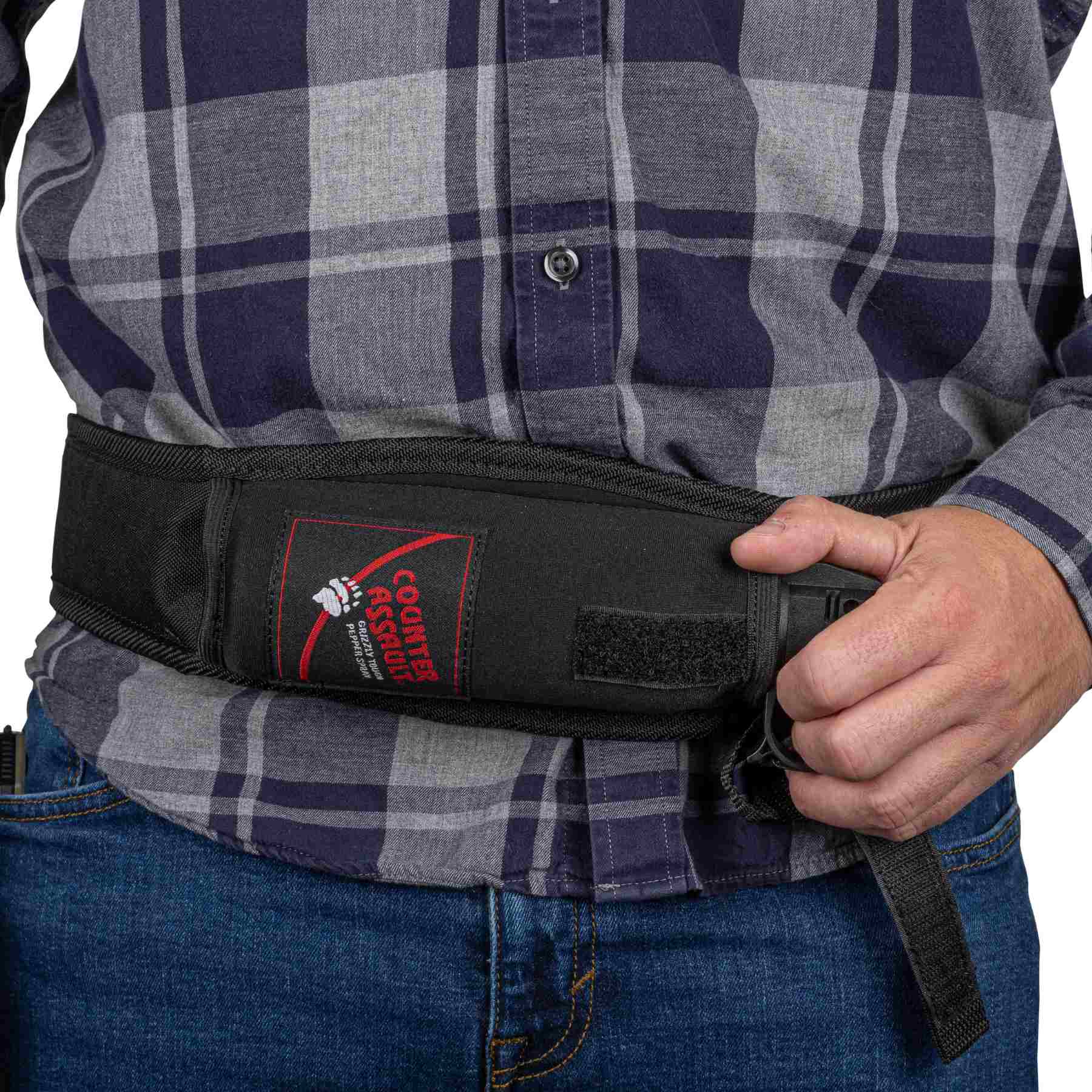 Man with a trail runner holster attached